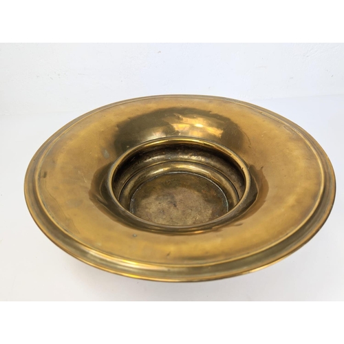 144 - A large vintage brass bowl and a Middle Eastern brass pitcher. Bowl measures 38x11cm