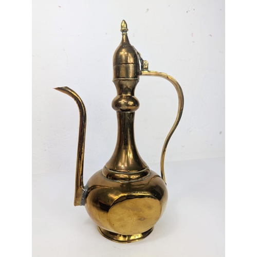 144 - A large vintage brass bowl and a Middle Eastern brass pitcher. Bowl measures 38x11cm