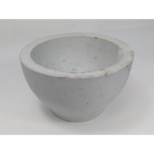 145 - A large Pestle & Mortar. 19x11.5cm