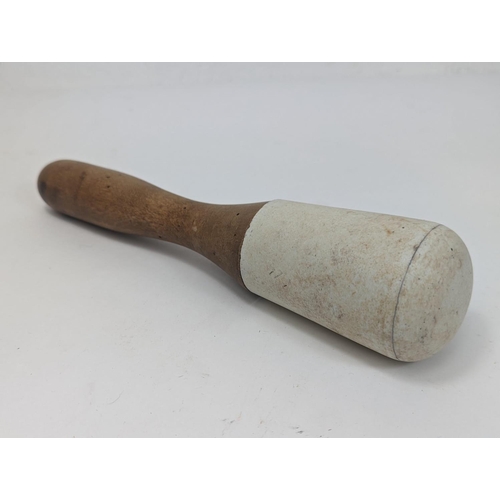 145 - A large Pestle & Mortar. 19x11.5cm