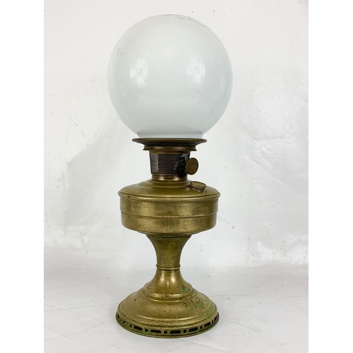 15 - A vintage brass oil lamp. 45cm.