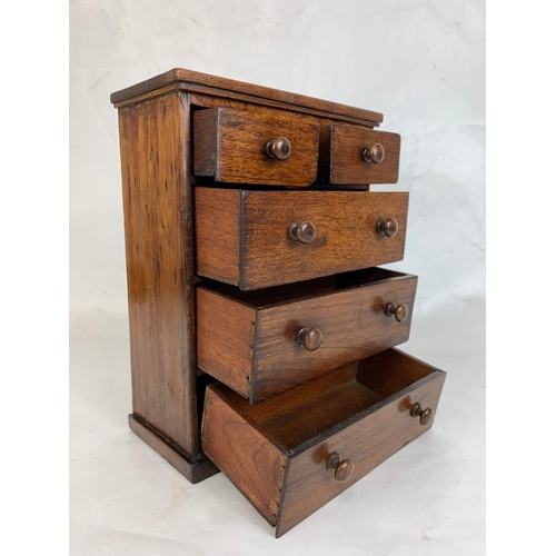 152 - A late Victorian Apprentice chest. 22 x 11 x 29.5cm.