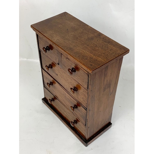 152 - A late Victorian Apprentice chest. 22 x 11 x 29.5cm.