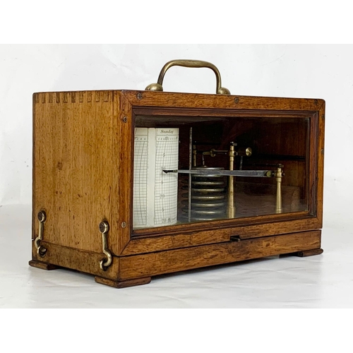 155 - An Edwardian period Barograph in an oak case. 29 x 13 x 17cm.