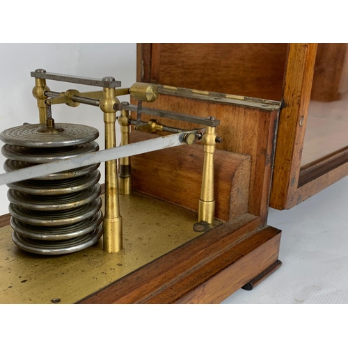 155 - An Edwardian period Barograph in an oak case. 29 x 13 x 17cm.