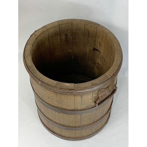 159 - A large early 20th century oak umbrella stick stand in form of a barrel. Circa 1900. 40 x 44.5cm