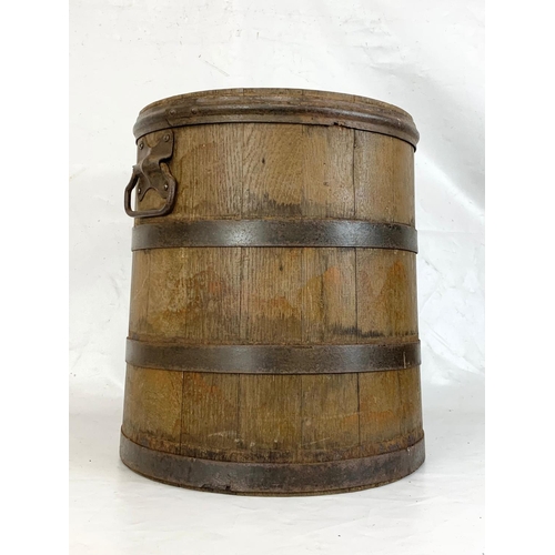 159 - A large early 20th century oak umbrella stick stand in form of a barrel. Circa 1900. 40 x 44.5cm