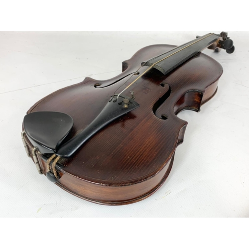 16 - A late 19th century violin in case. Case measures 79cm.