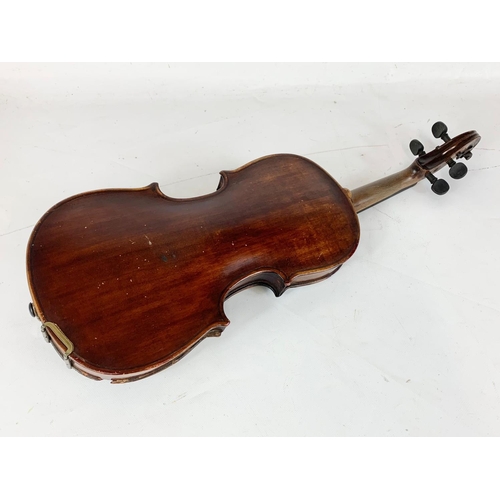 16 - A late 19th century violin in case. Case measures 79cm.