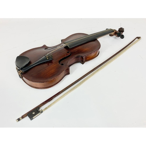 16 - A late 19th century violin in case. Case measures 79cm.