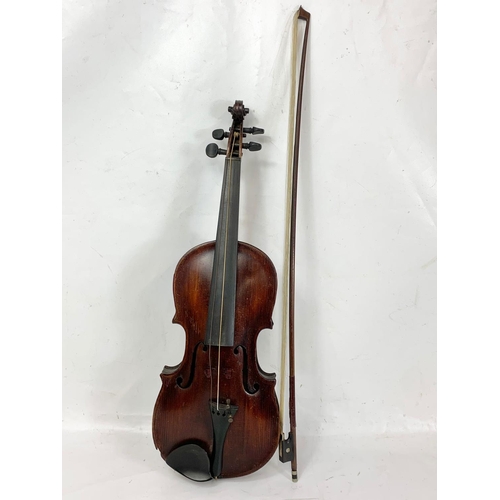 16 - A late 19th century violin in case. Case measures 79cm.