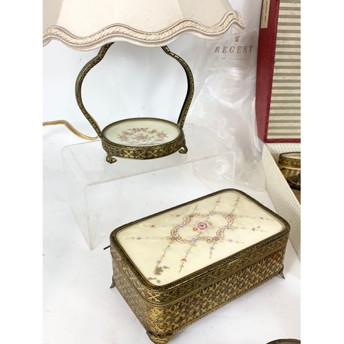 160 - A vintage vanity set by Regent of London.