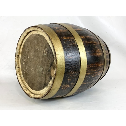 162 - A 19th century Sarson’s Malt Vinegar brass blind barrel. 44 x 53.5cm.