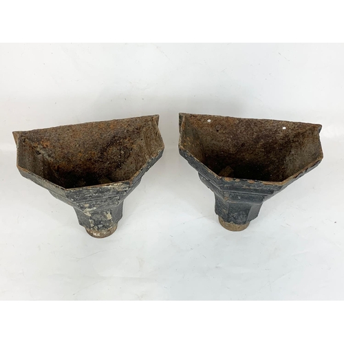 163 - A pair of Victorian cast iron hoppers. 31 x 20 x 27cm.