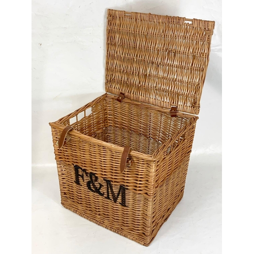 165 - A large wicker basket. 47 x 38 x 45cm.