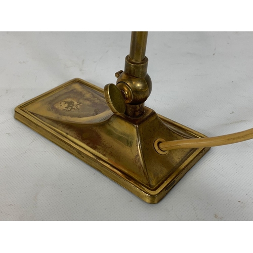 166 - A vintage brass swan neck adjustable lamp with glass shade. 35cm.