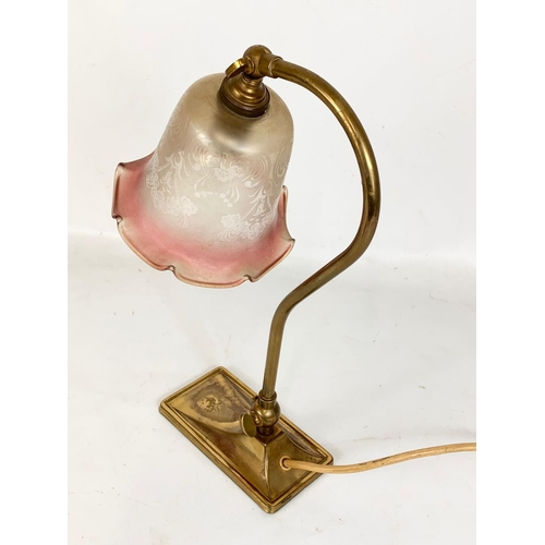 166 - A vintage brass swan neck adjustable lamp with glass shade. 35cm.