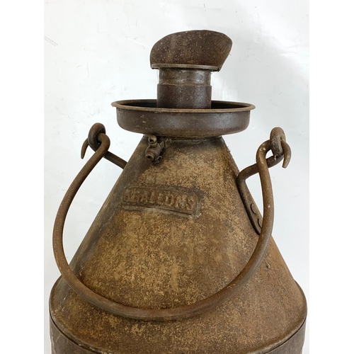 175 - A large early 20th century oil can. 5 Gallons. 63cm.