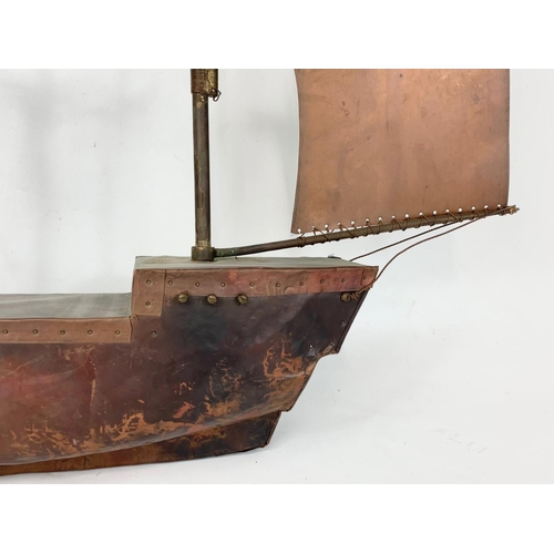 186 - A late 19th century copper weathervane top. 77 x 41cm.