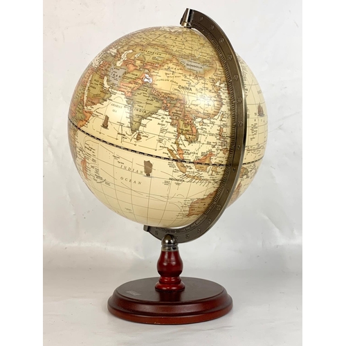 188 - A globe on wooden base. 35cm.