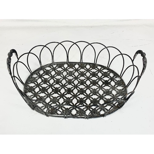 19 - 4 matching vintage wrought iron baskets. 45.5 x 32 x 13.5cm