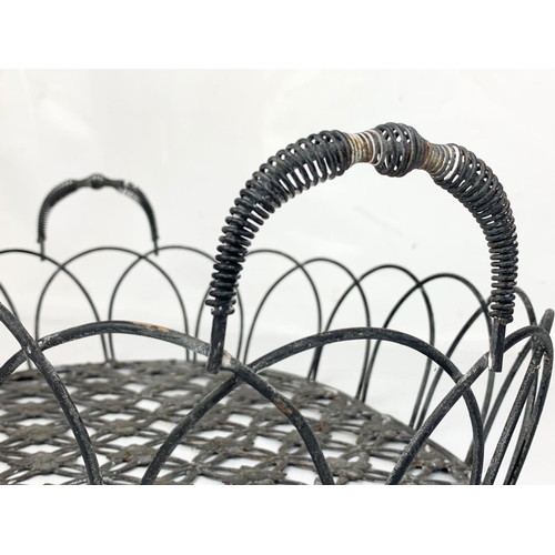 19 - 4 matching vintage wrought iron baskets. 45.5 x 32 x 13.5cm