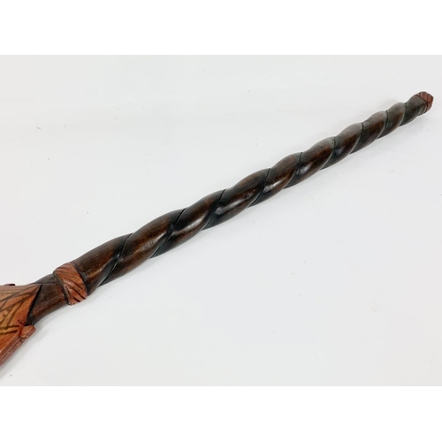 239 - 2 African walking sticks. 92cm