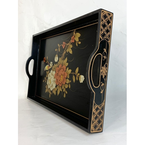 241 - 2 Chinese lacquered serving trays. 53 x 33 x 7cm