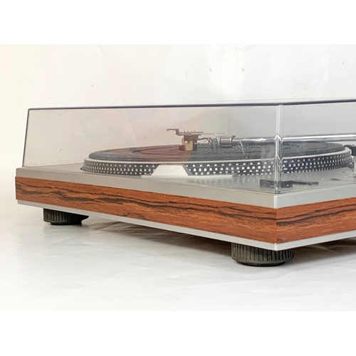 246 - A vintage Sanyo turntable record player with rosewood banding. TP-1010 PLL Servo Drive. 44 x 34.5 x ... 