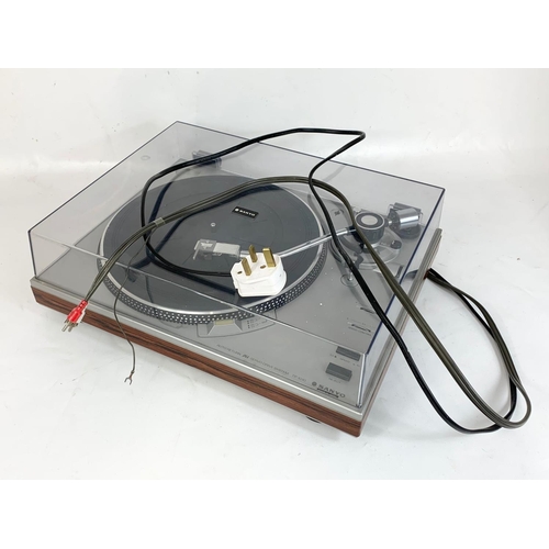 246 - A vintage Sanyo turntable record player with rosewood banding. TP-1010 PLL Servo Drive. 44 x 34.5 x ... 