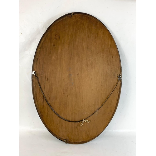 257 - An Edwardian mahogany framed mirror. 56 x 81cm.