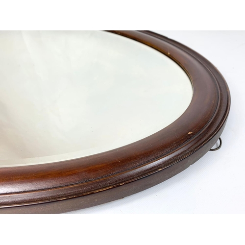 257 - An Edwardian mahogany framed mirror. 56 x 81cm.