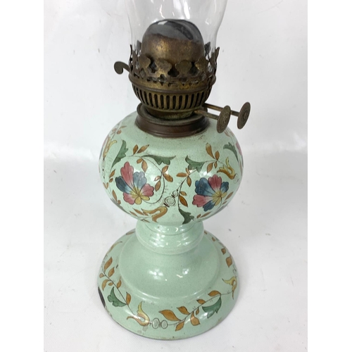 264 - A Victorian porcelain oil lamp. 50cm.