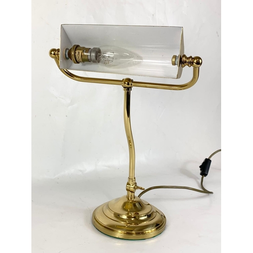 265 - A heavy brass adjustable desk lamp. 38cm.