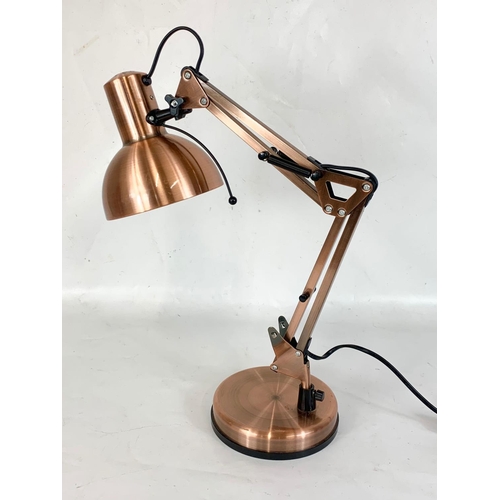 268 - A modern angle poise desk lamp. 47cm.