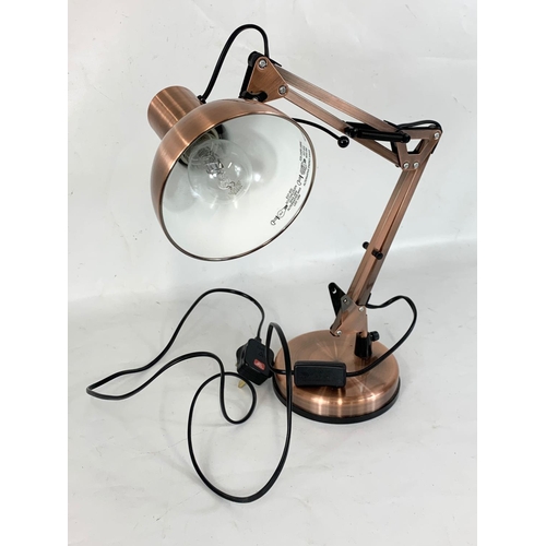 268 - A modern angle poise desk lamp. 47cm.