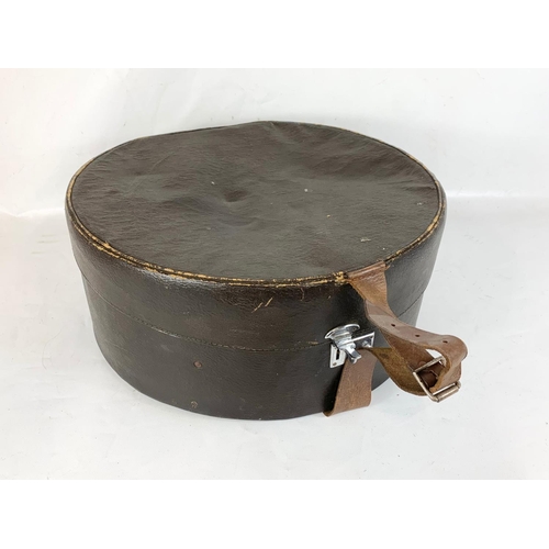 270 - A vintage hat box with 3 hats. Box measures 45 x 20cm.