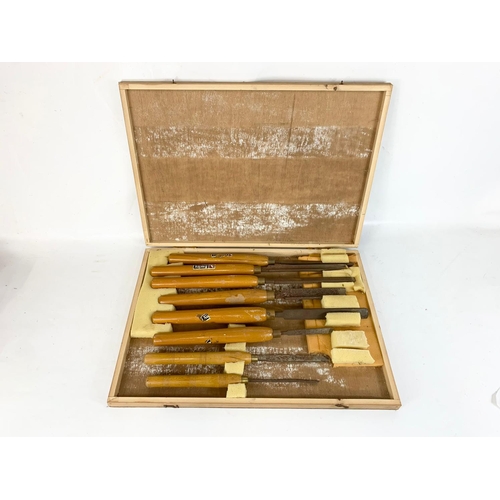 271 - A large box of Robert Sorby wood turnings. Largest chisel measures 51cm. Box measures 58cm.