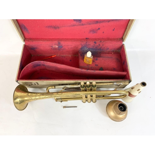 272 - A vintage Dallas “Monarch” trumpet in case.