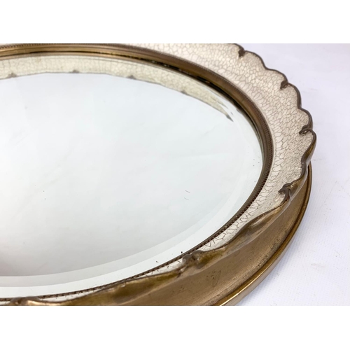 274 - A vintage ornate gilt framed mirror. 41cm.