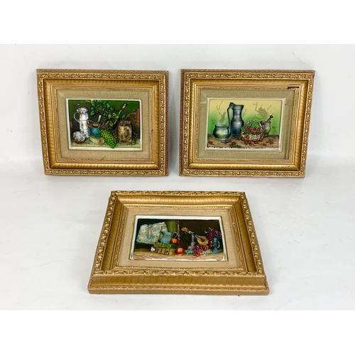 277 - A set of 3 gilt framed plaques. 30 x 24.5cm.