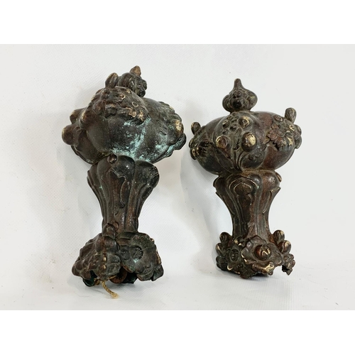 279 - A pair of 19th century French clock weights. 17cm