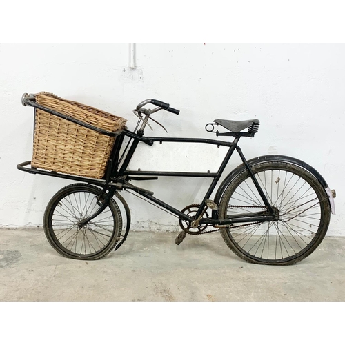 281 - An early 20th century Raleigh shops carrier Butcher Bike. Bike measures 186cm. Basket measures 62 x ... 