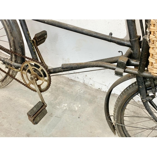 281 - An early 20th century Raleigh shops carrier Butcher Bike. Bike measures 186cm. Basket measures 62 x ... 