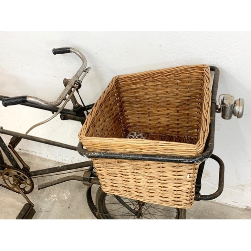 281 - An early 20th century Raleigh shops carrier Butcher Bike. Bike measures 186cm. Basket measures 62 x ... 