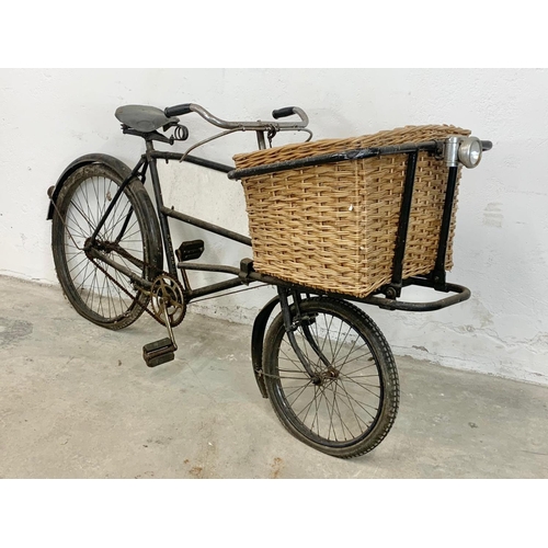 281 - An early 20th century Raleigh shops carrier Butcher Bike. Bike measures 186cm. Basket measures 62 x ... 