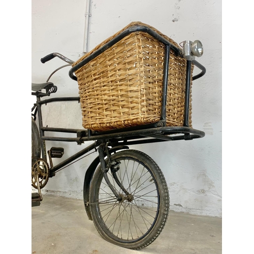 281 - An early 20th century Raleigh shops carrier Butcher Bike. Bike measures 186cm. Basket measures 62 x ... 