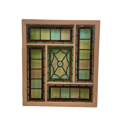 29 - A large Victorian stained and lead glass panel in a wooden frame. 86.5 x 99cm.