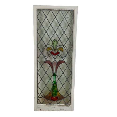 292 - A large late 19th century stained glass panel. 55 x 140cm