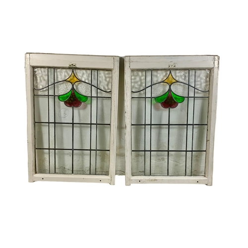 294 - A pair of large late 19th century stained glass panels. 68 x 98cm